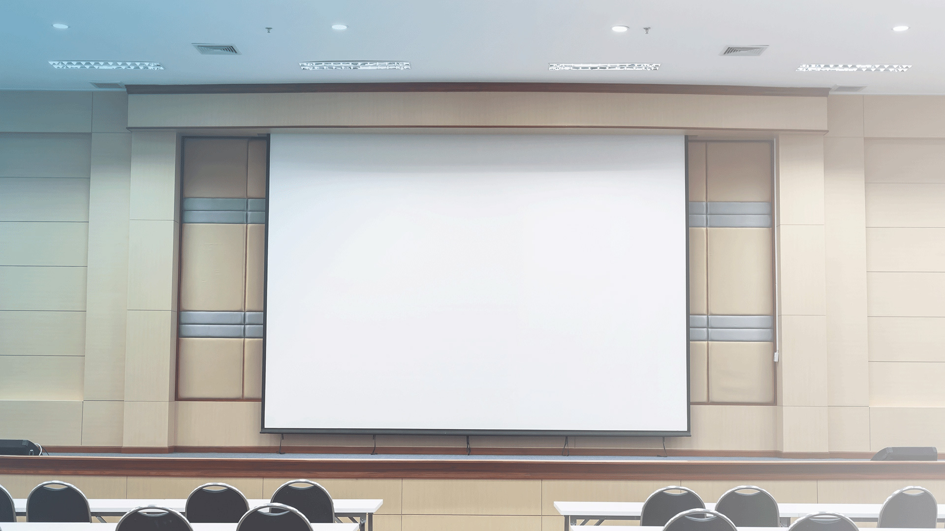 University lecture hall with a projector screen