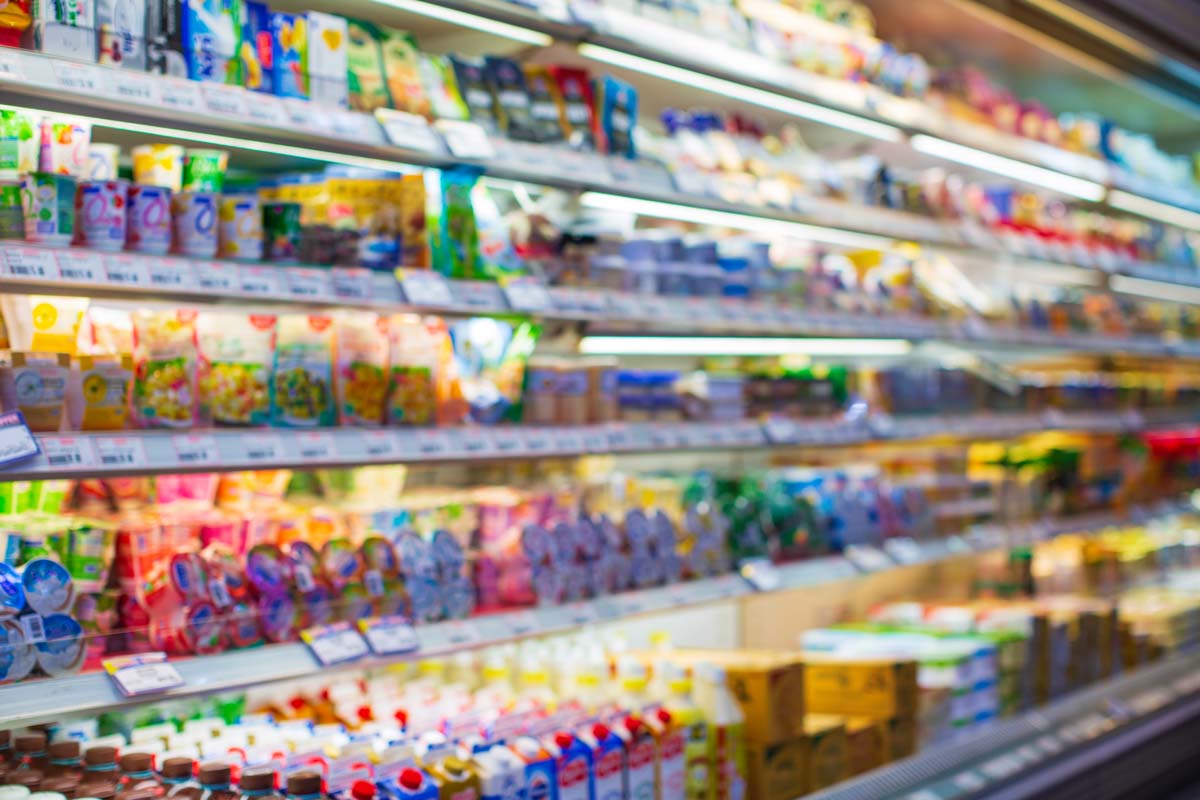 Fully stocked dairy section in the grocery store