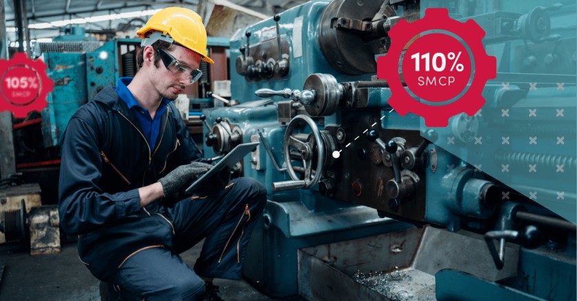 Automotive production line worker checking asset on the iPad