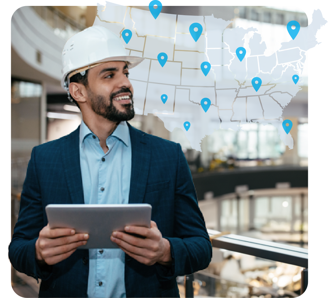 Maintenance manager holding a tablet